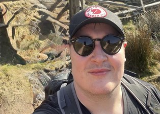 Cropped photo of Sam